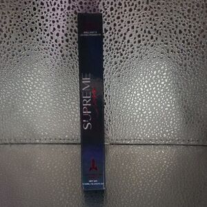 Jeffree Star Supreme Lip Gloss Packaging in Black and Deep Blue with Red Logo